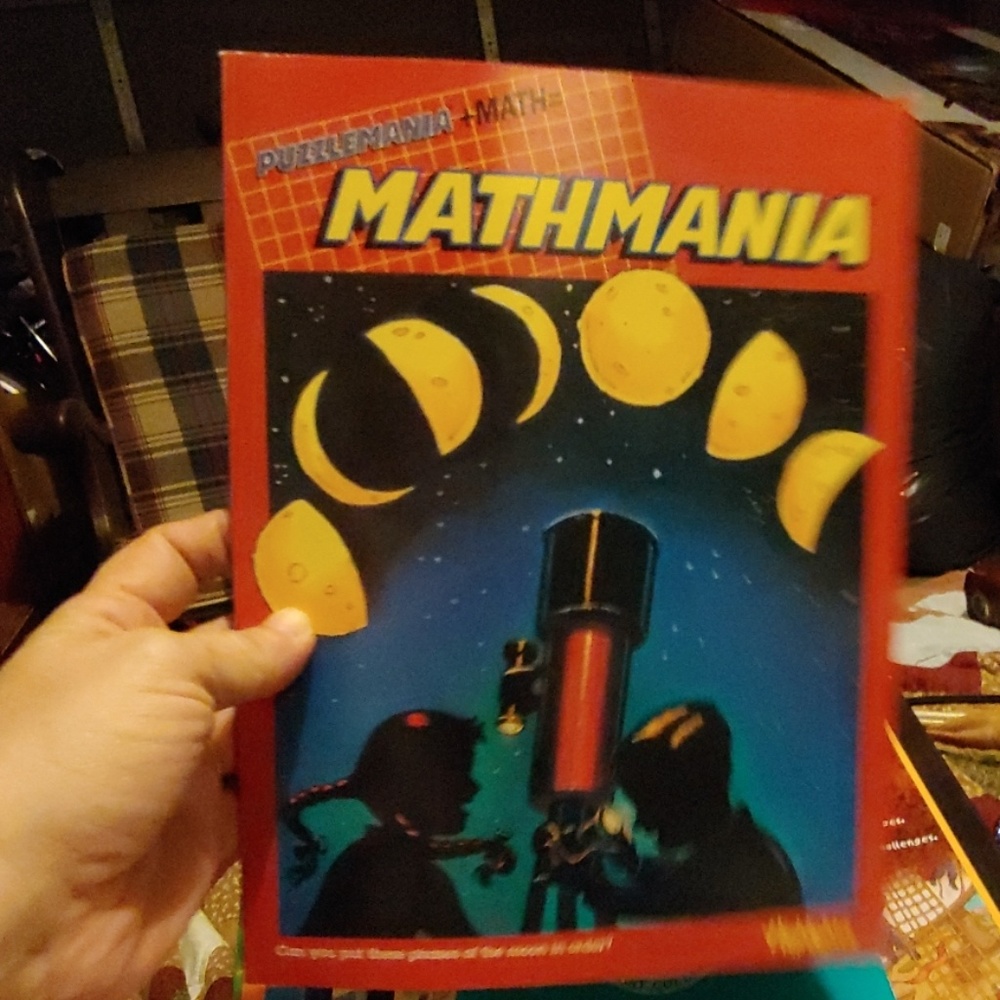 Mathmania puzzle and math book